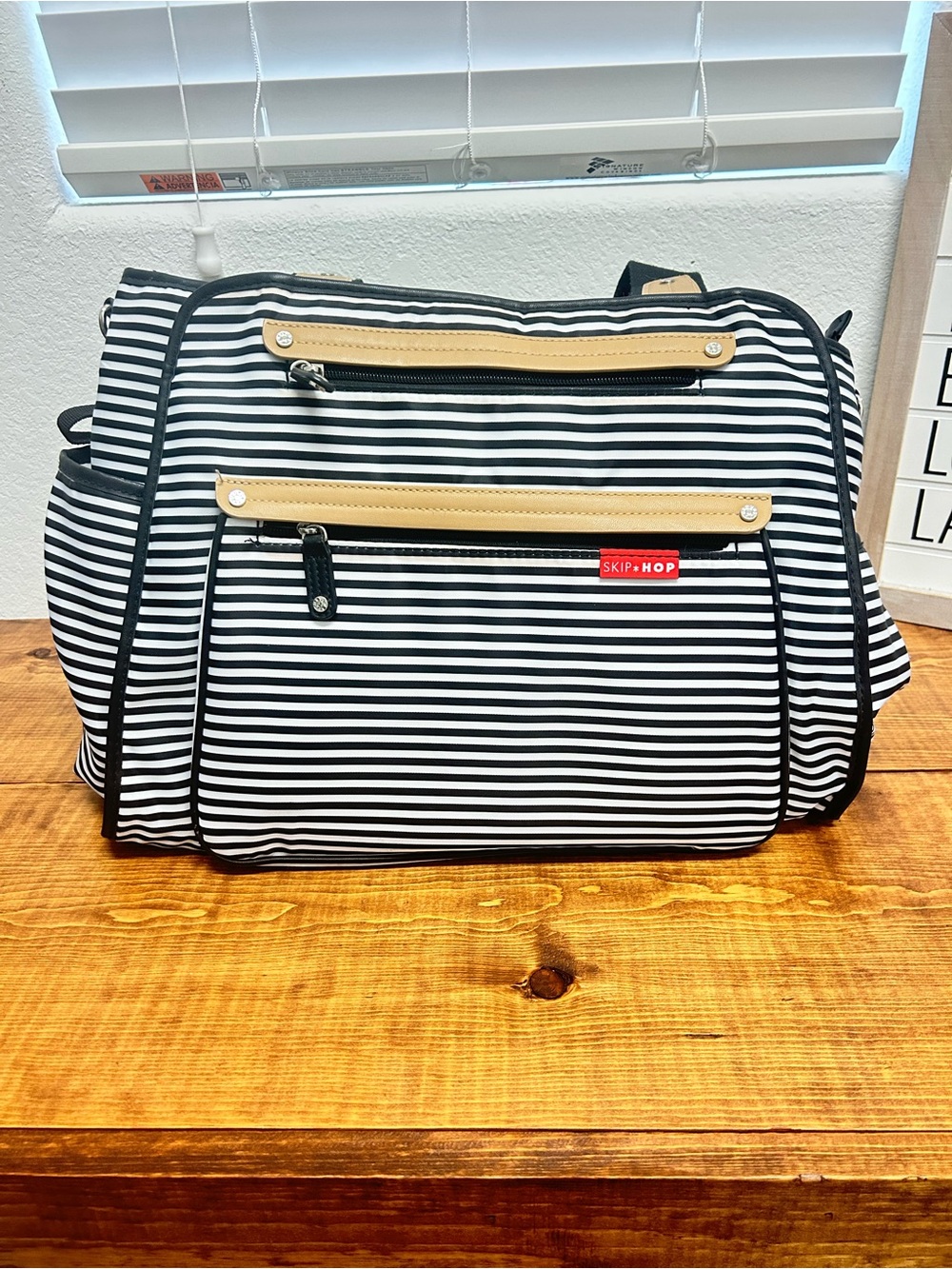 Skip Hop Black & White Striped diaper bag with Tan Accents